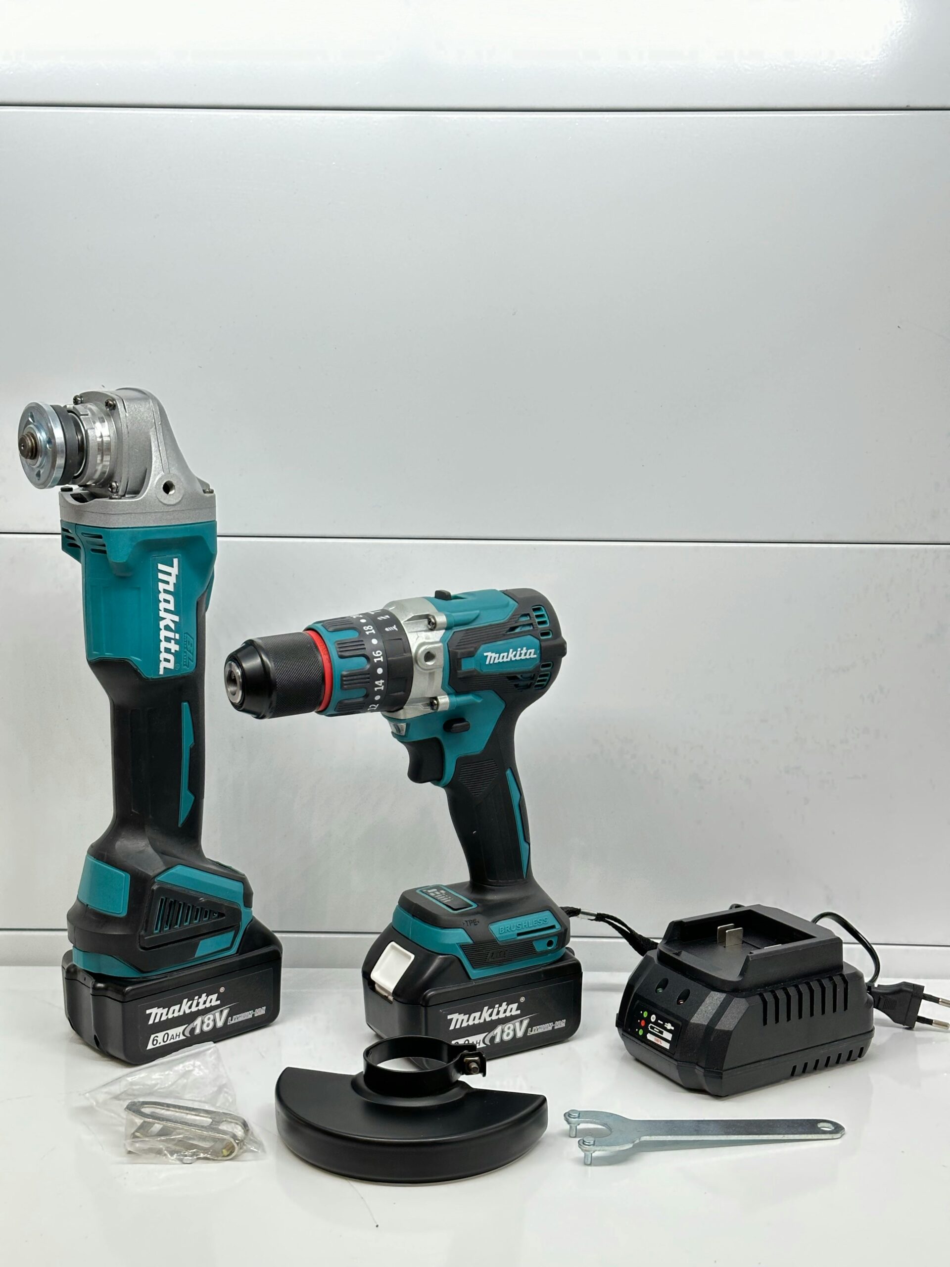 High-quality power tools including drill-driver and accessories displayed on a white background.